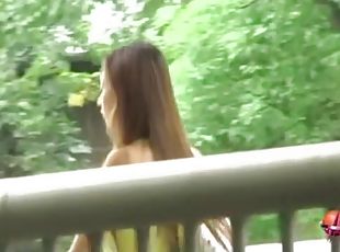 Asian babe wearing no panties gets street sharked in a park.
